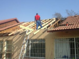 Structural roof repairs. Replacing roof beams and trusses.